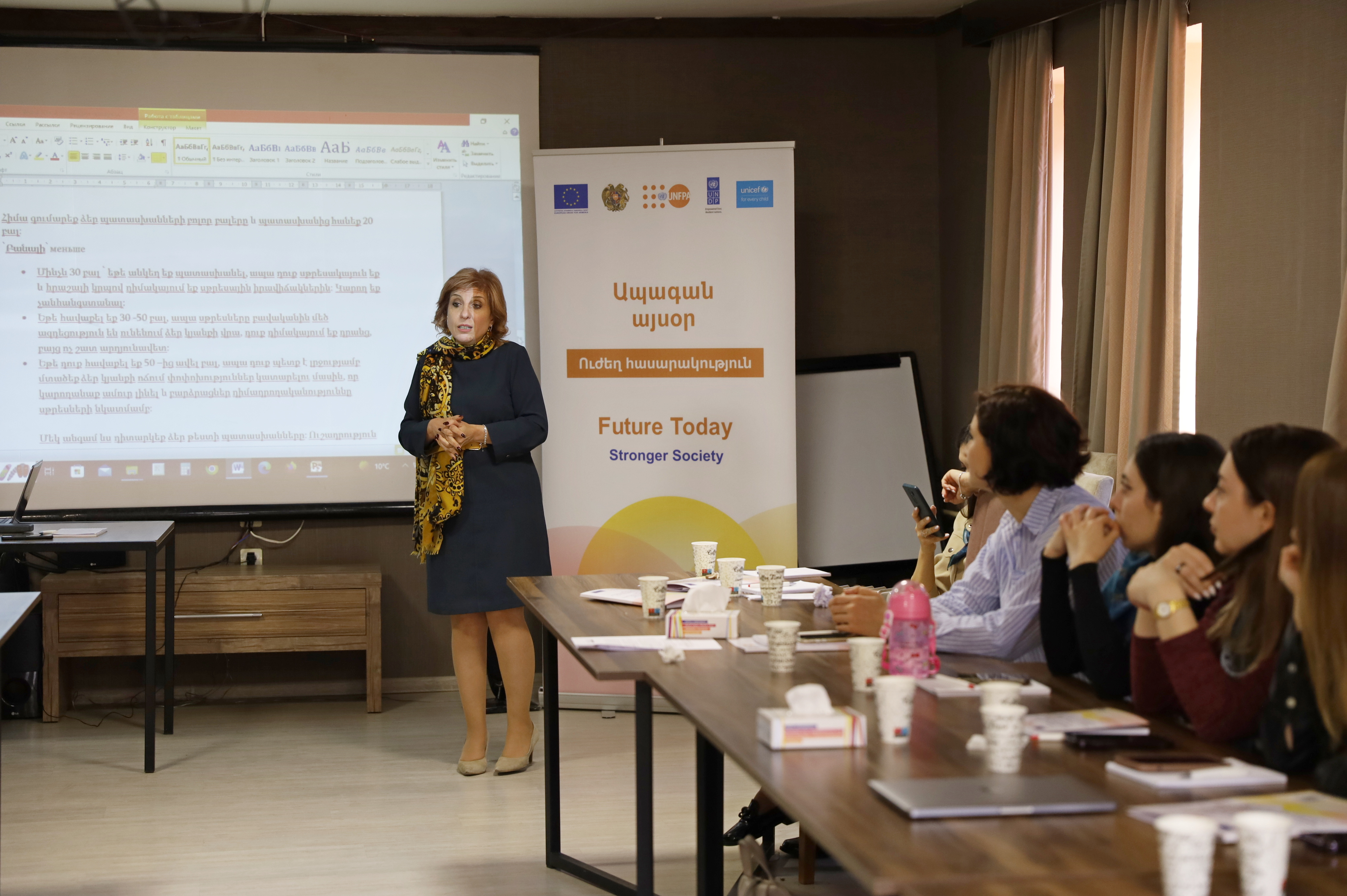 Image depicting Lilit Baghdasaryan, the coordinator of the psychological service at the Center of Psychosocial Support, leading a stress management session