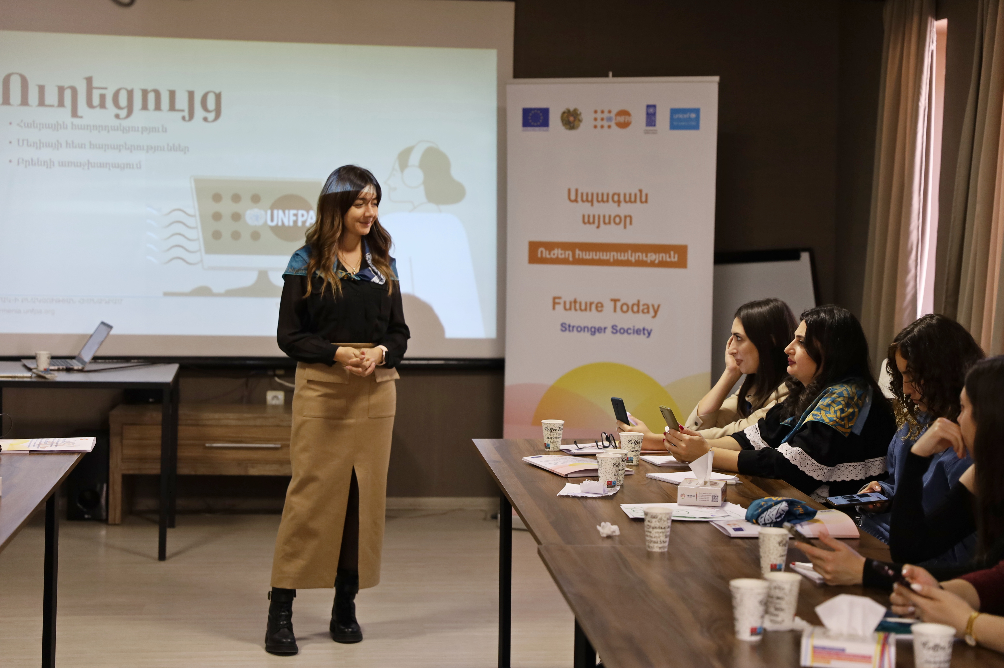 Photo featuring Mari Mkhitaryan, UNFPA Armenia Communications Consultant, leading a workshop on Media and Public Communications