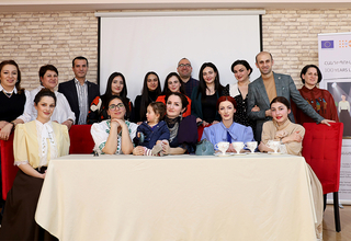 group photo with the participation of Event organizers and students of Eurasia University 