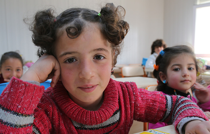 On 22 April 2015, young girls in classroom at the opening of a new education centre for Syrian children in Kahranmanmaras. Copyright: UNICEF/UN0191130/Ergen