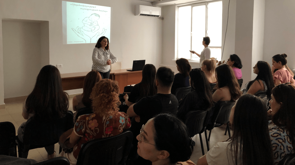 Narine Beglaryan, UNFPA Armenia SRH Program Coordinator, addresses the group of pregnant women.